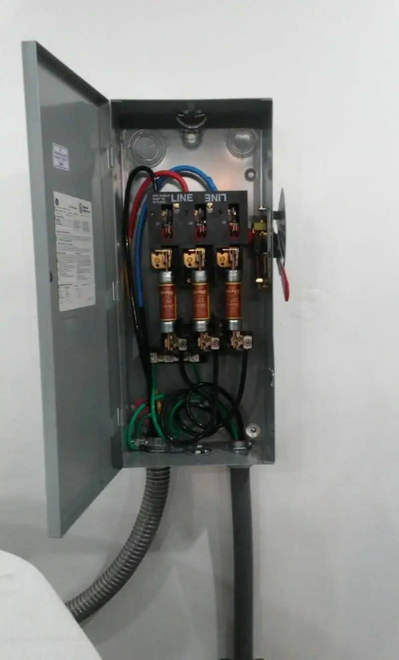 Three-phase disconnect switch installed for Smoke Detector Installation in Dent